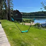 Сasa de vacaciones Mazurski Dom Nad Jeziorem & Sauna By Downtown Tomaszkowo